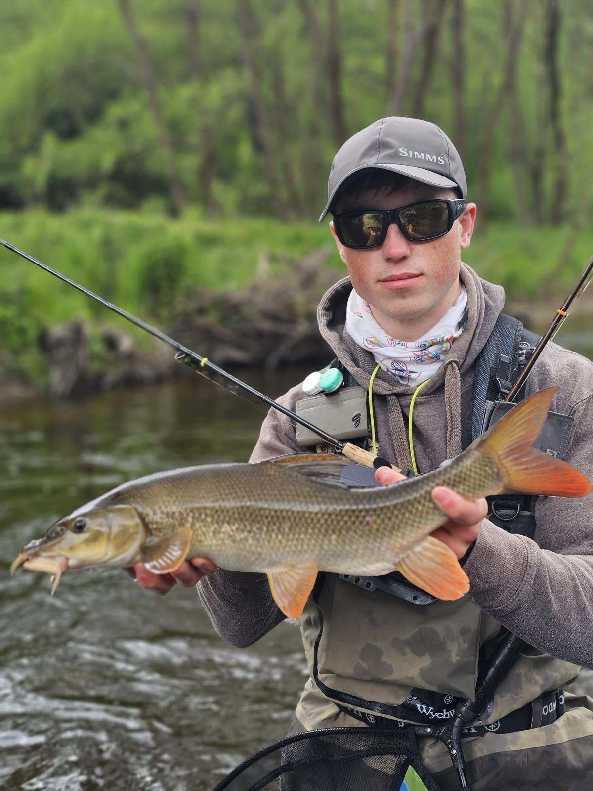 Young angler with catch — on tour with Loughrea Anglers